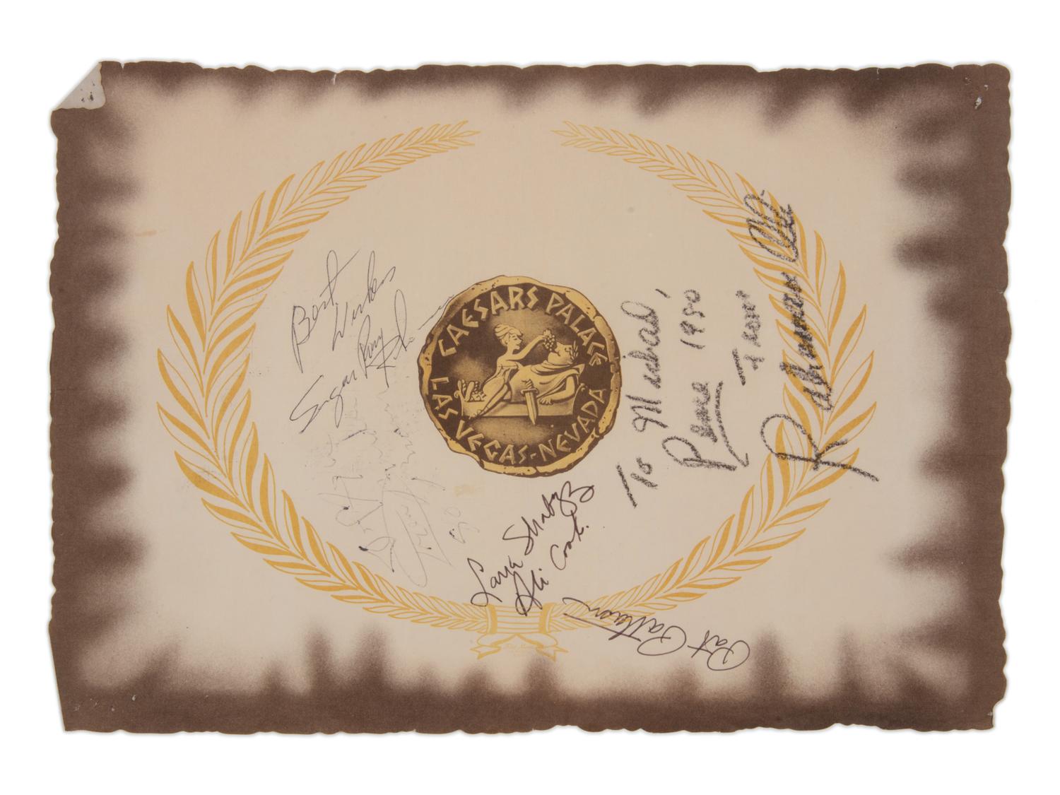 A 1980 Muhammad Ali's Entourage and Sugar Ray Robinson Signed Ceasars Palace Placemat,