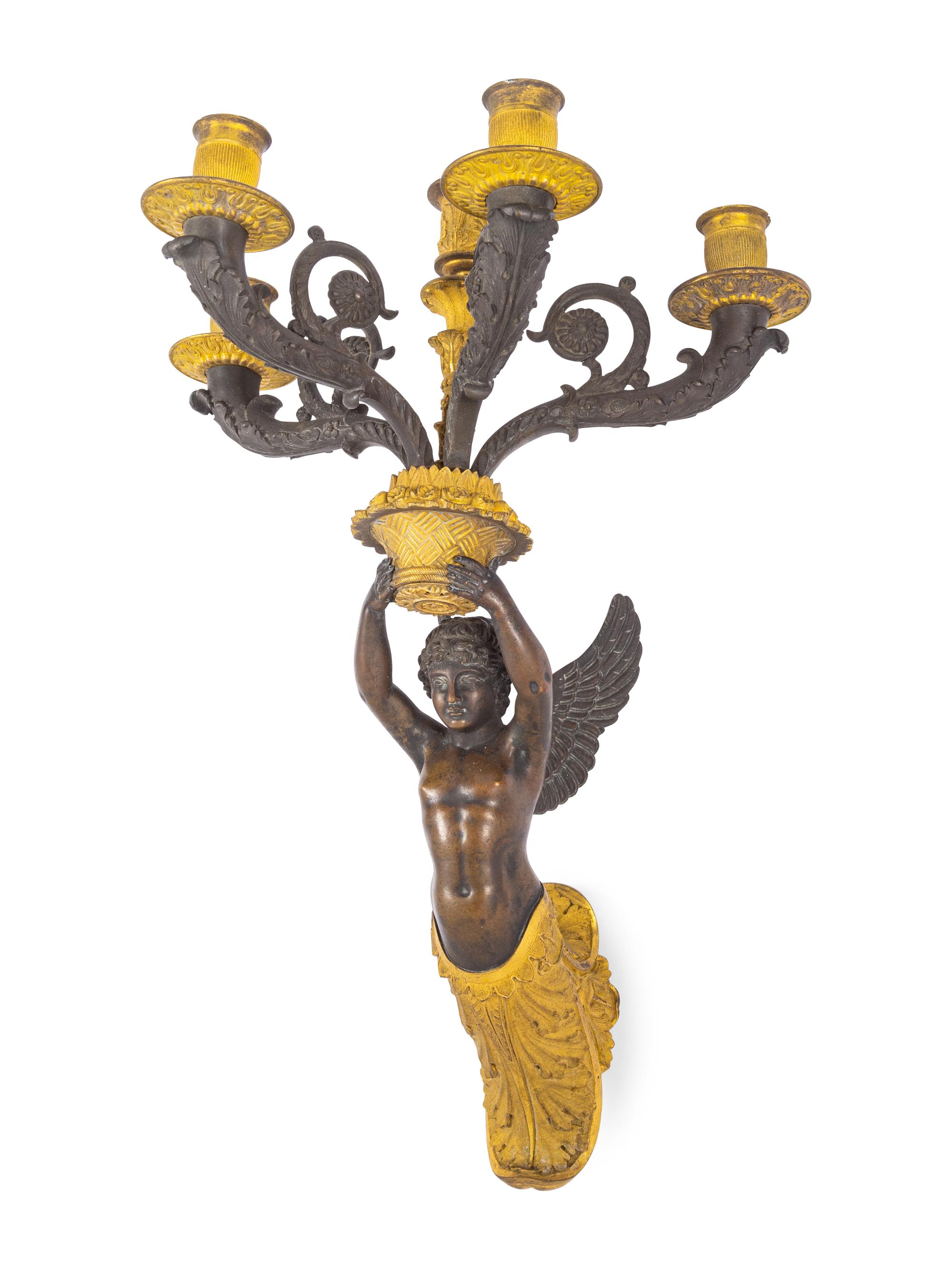 A Pair of Empire Style Gilt and Patinated Bronze Figural Five-Light Sconces