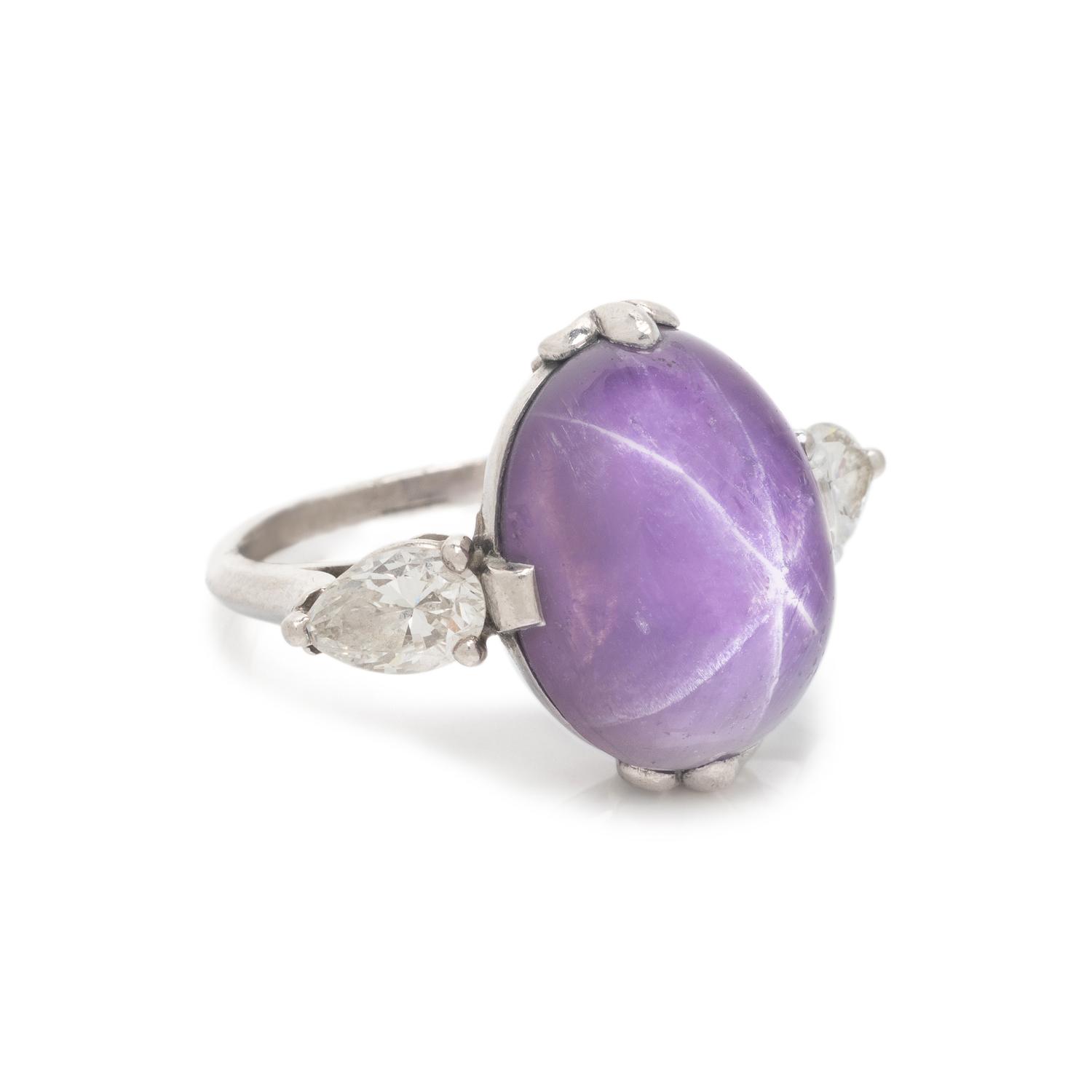 CARTIER, PURPLE COLOR CHANGE STAR SAPPHIRE AND DIAMOND RING