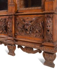 An Italian Renaissance Style Carved Walnut Cabinet