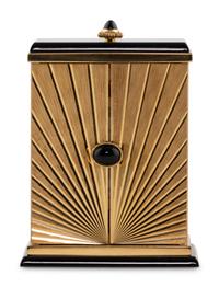 A Cartier Engraved Brass and Onyx Travel Clock