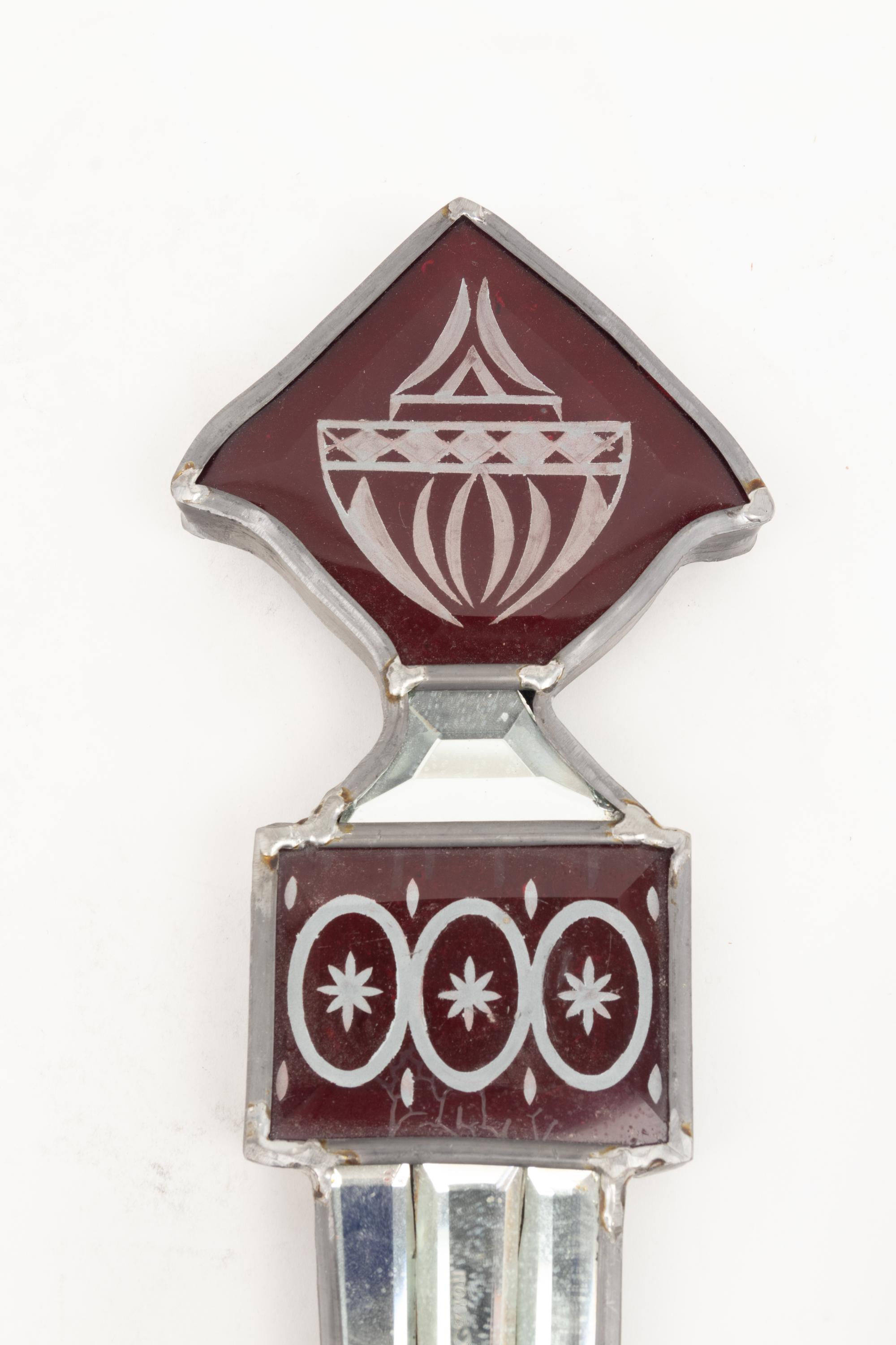 A Set of Three Mirrored, Red Glass and Brass Two-Light Sconces