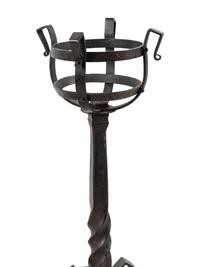 A Pair of Continental Iron Andirons