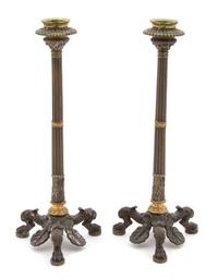 A Pair of Louis XVI Style Bronze Candlesticks Height 10 1/2 inches. — 19TH CENTURY