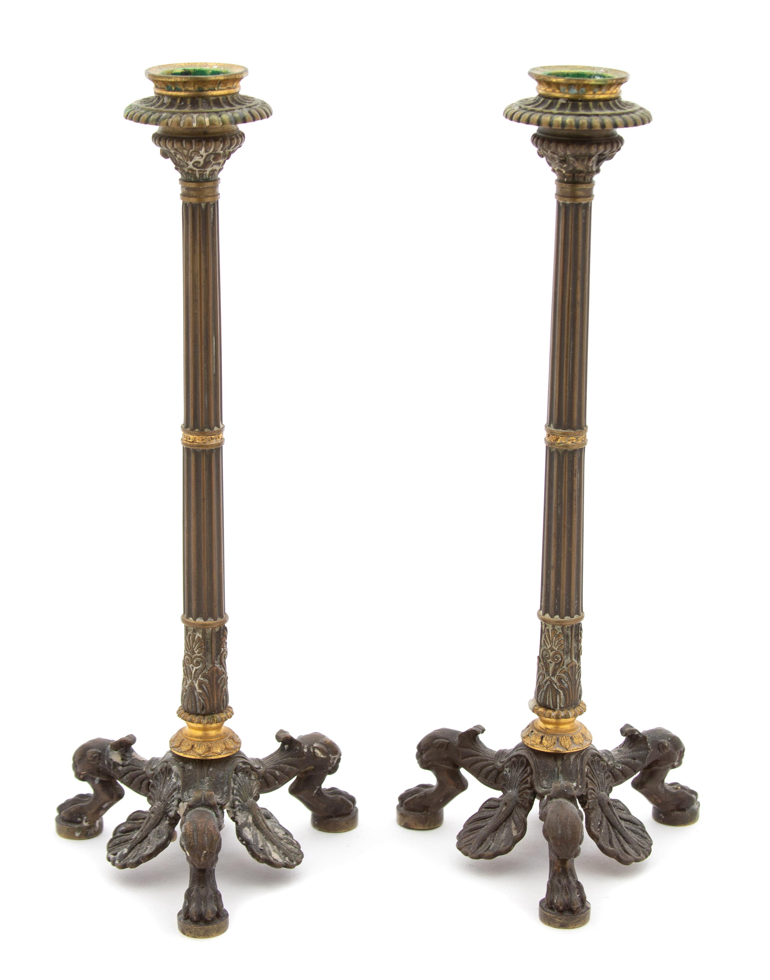 A Pair of Louis XVI Style Bronze Candlesticks Height 10 1/2 inches. — 19TH CENTURY