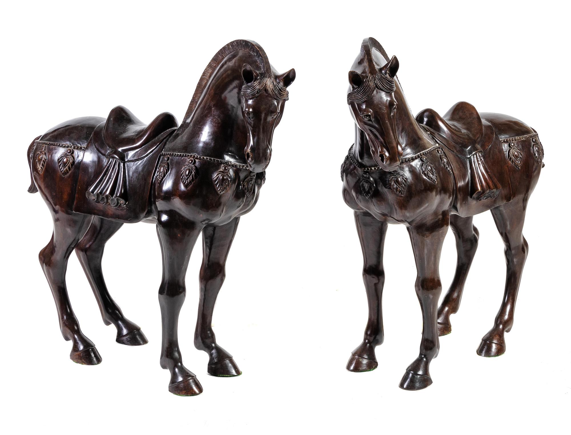 A Pair of Bronze Models of Horses