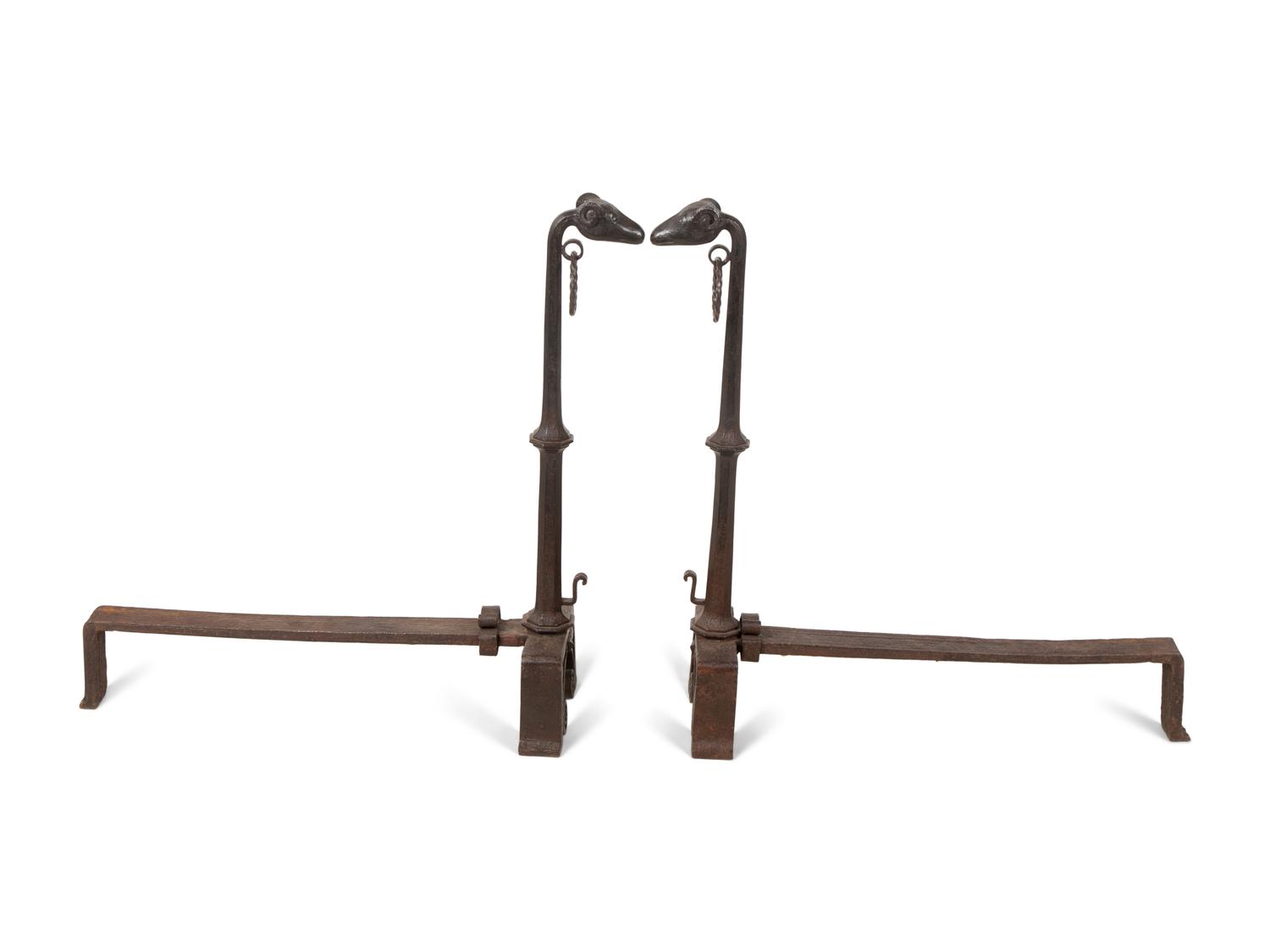 A Pair of Bronze Andirons with Ram Head Finials — 20TH CENTURY