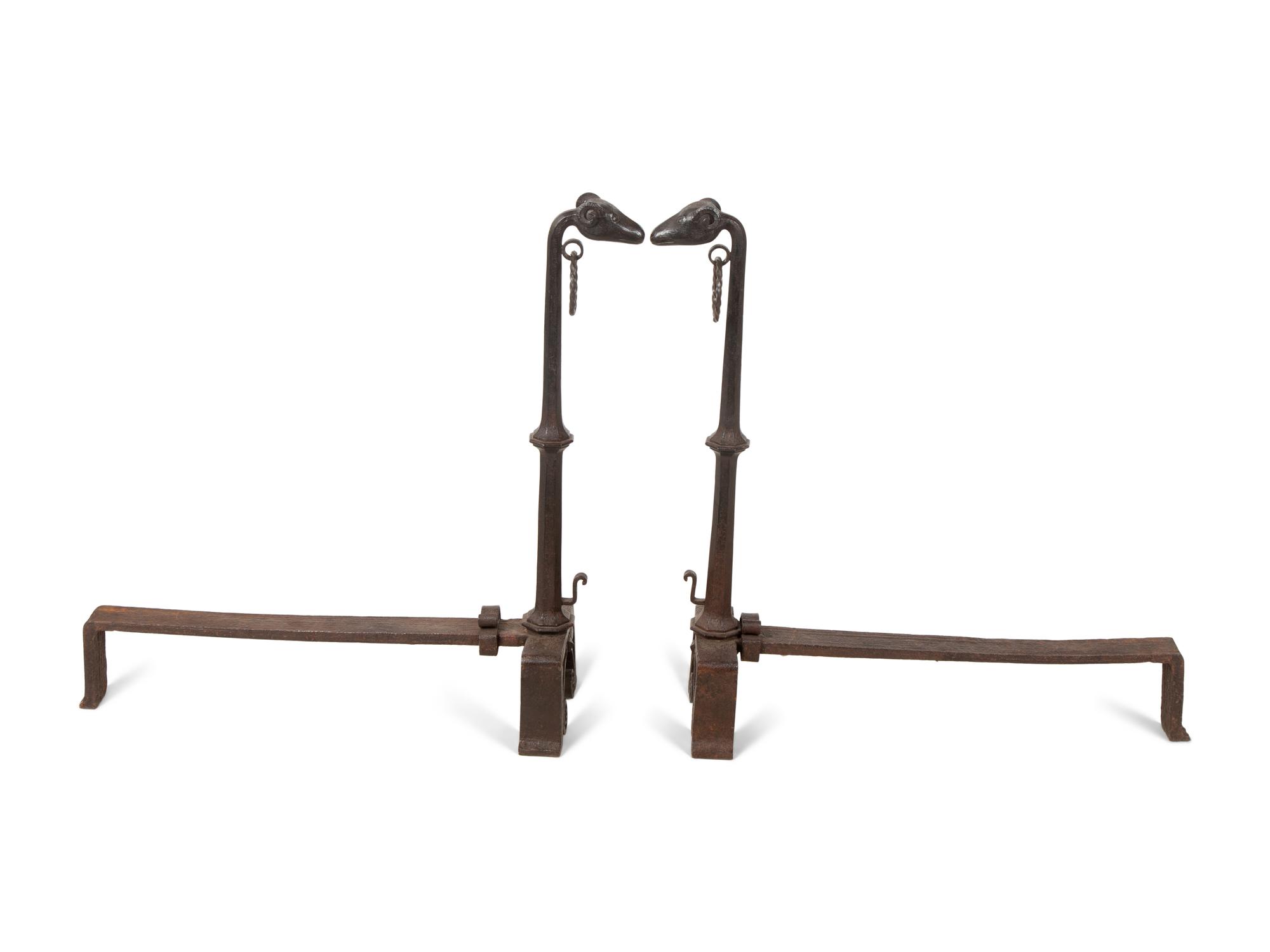 A Pair of Bronze Andirons with Ram Head Finials — 20TH CENTURY