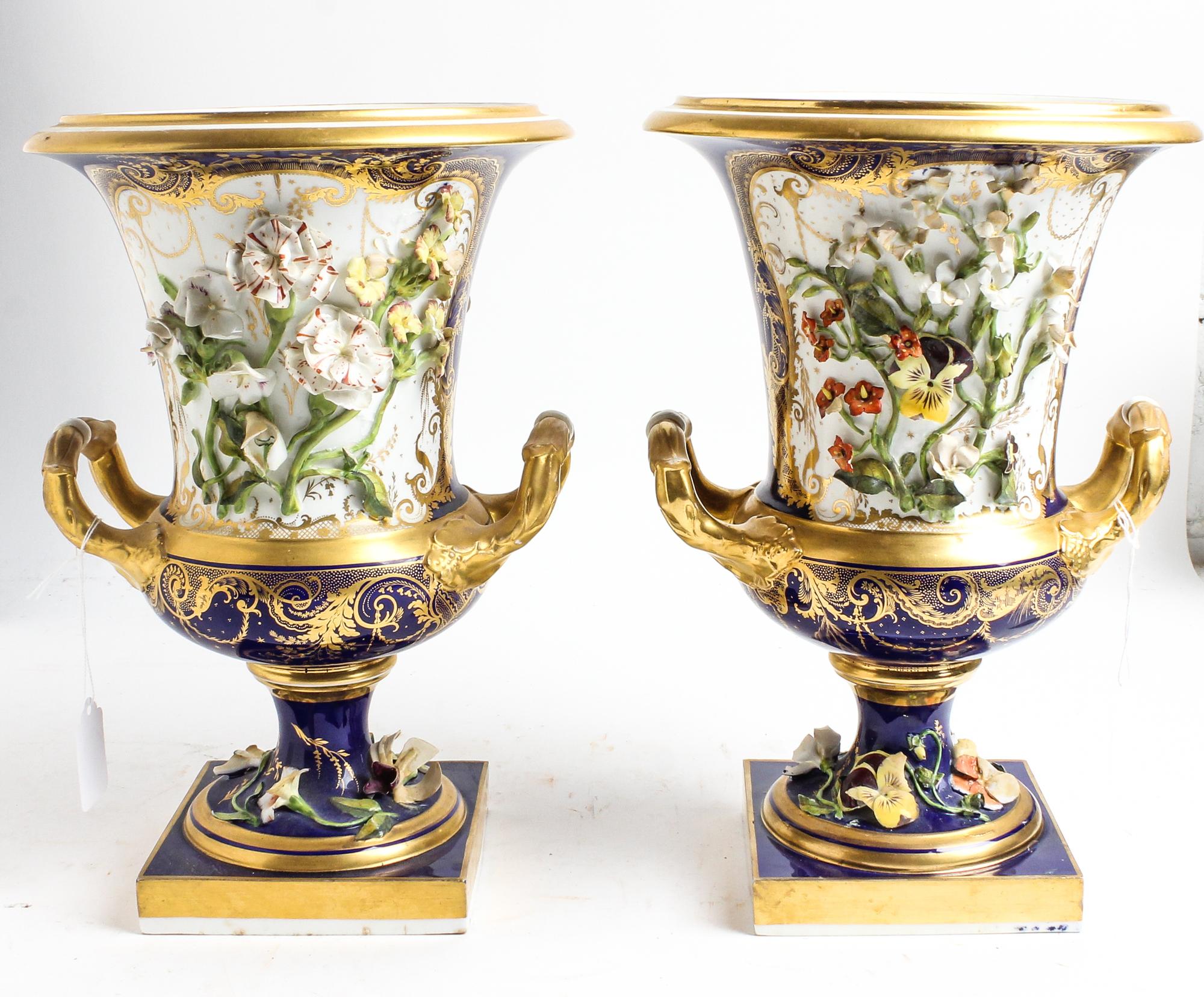 A Pair of Continental Porcelain Urns Height 12 1/2 inches. — 20TH CENTURY