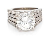 An 18 Karat White Gold and Diamond Ring Set, 8.70 dwts.