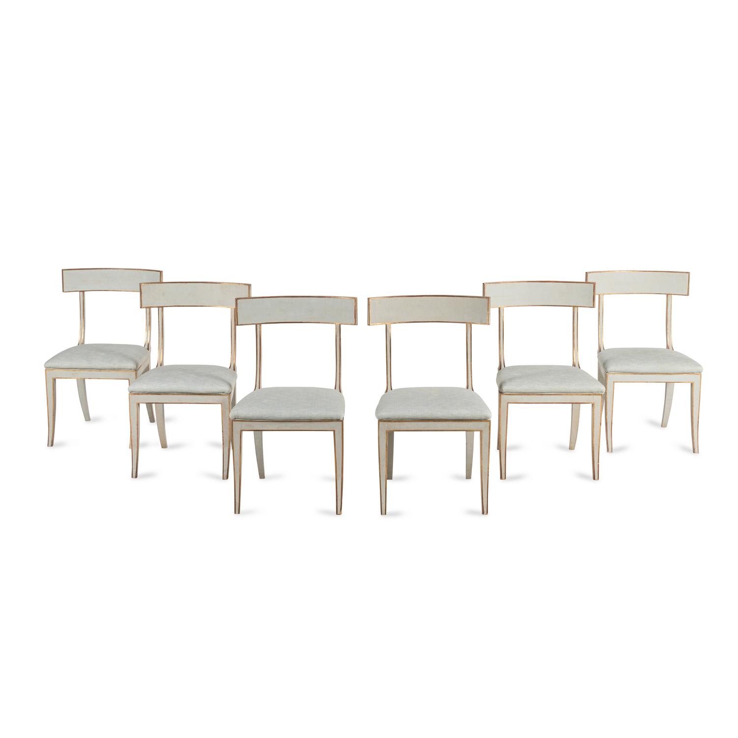 A Group of Six Light Blue-Painted and Parcel-Gilt Klismos Dining Chairs
