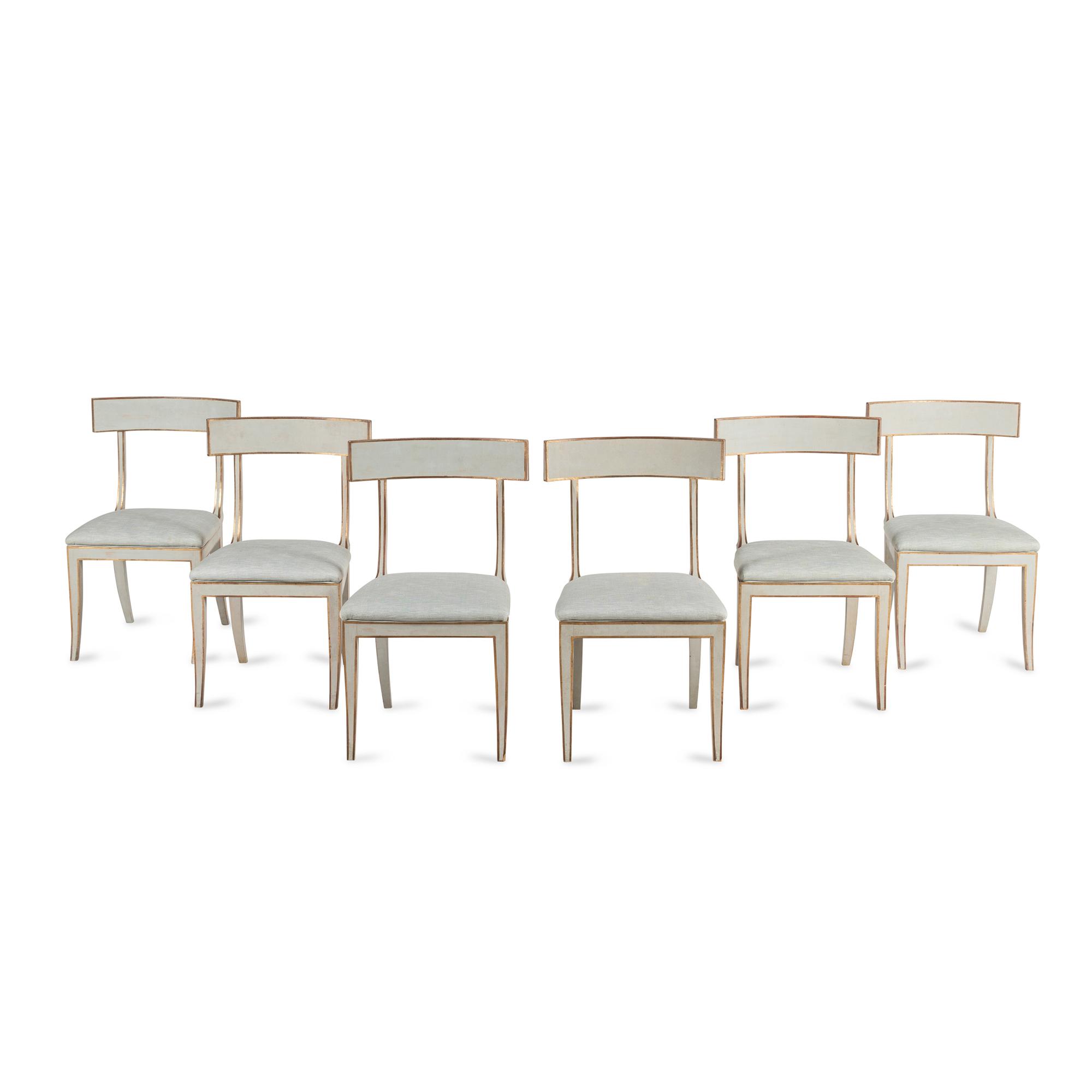 A Group of Six Light Blue-Painted and Parcel-Gilt Klismos Dining Chairs