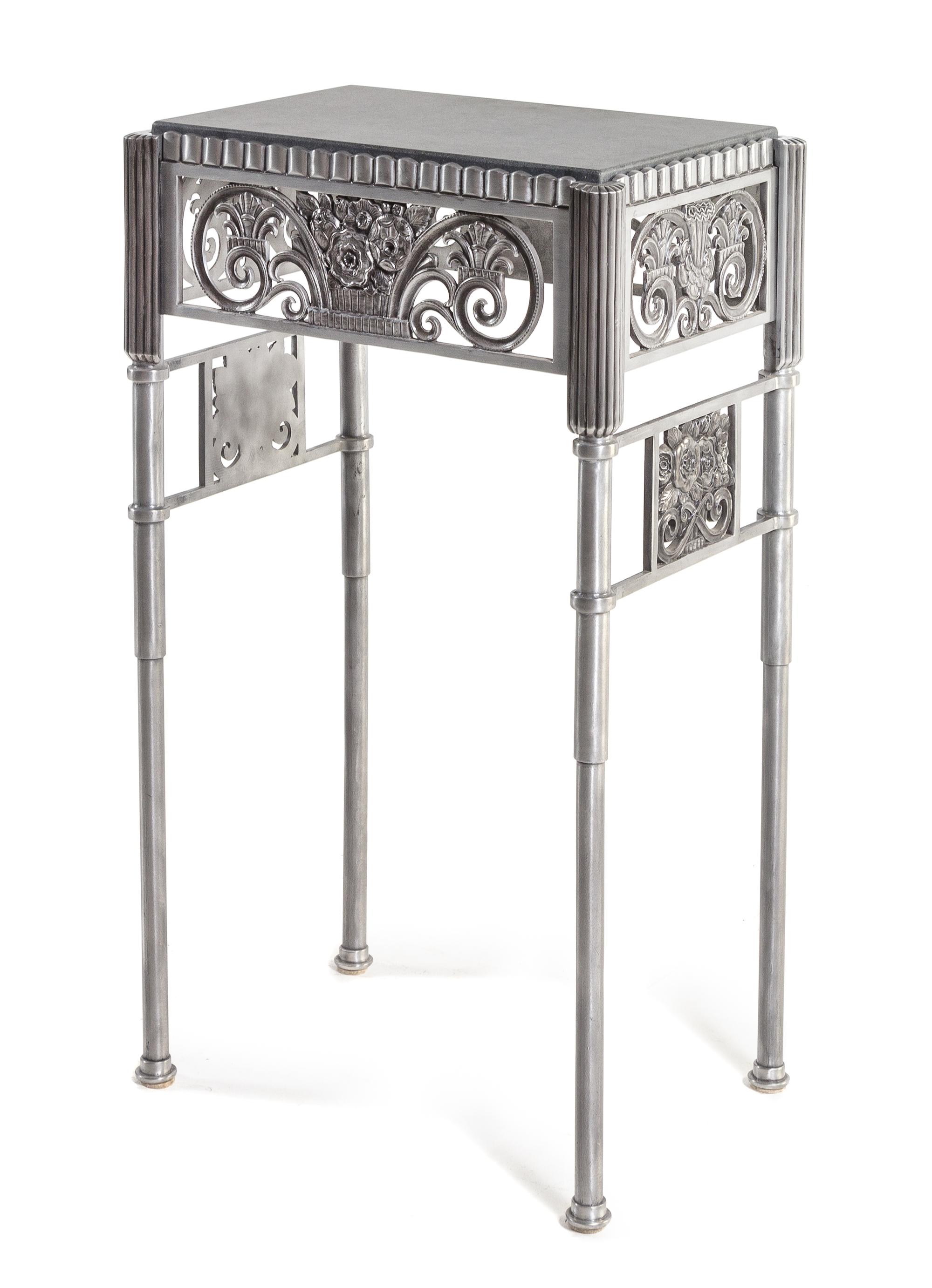 Manner of Edgar Brandt, France, 1930s, an Art Deco table
