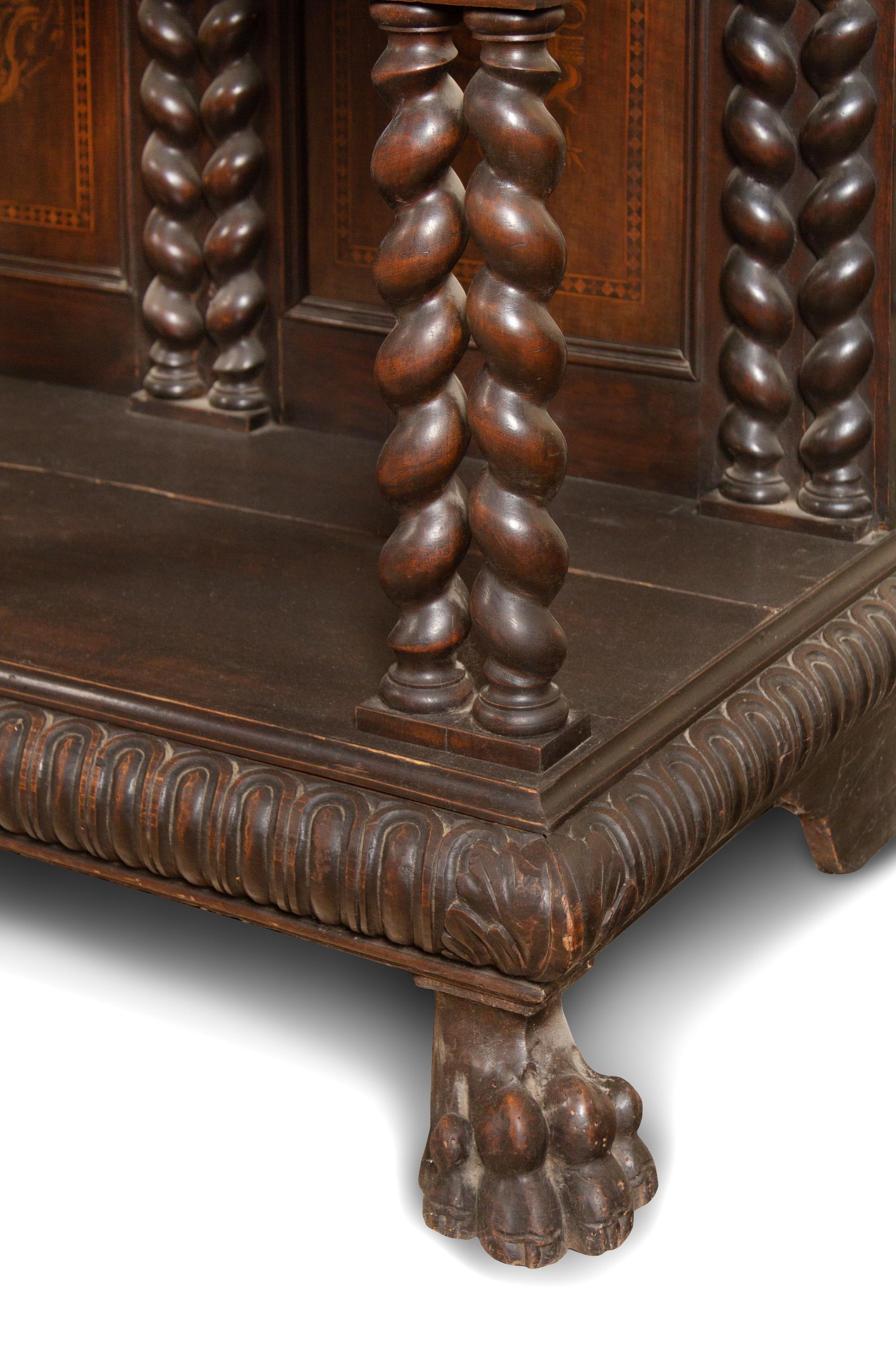 An Italian Baroque Style Carved Walnut and Marquetry Cabinet on Stand