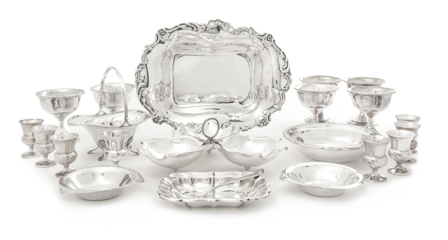 Collection of American Silver Table Articles, Various Makers, comprising a cake dish, serving tray, sugar basket, candy dish, five nut