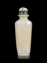A Celadon and Russet Jade Snuff Bottle