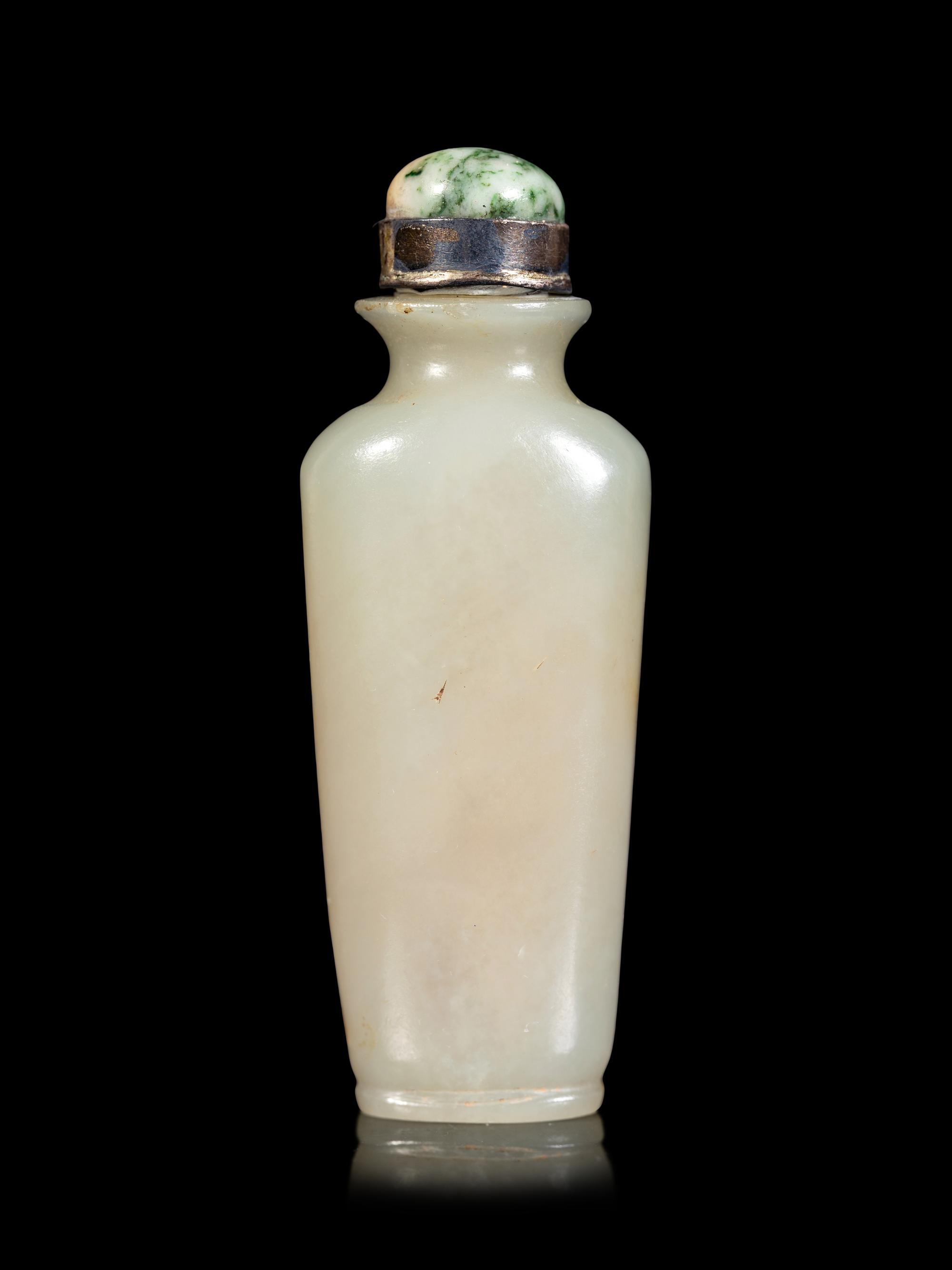A Celadon and Russet Jade Snuff Bottle