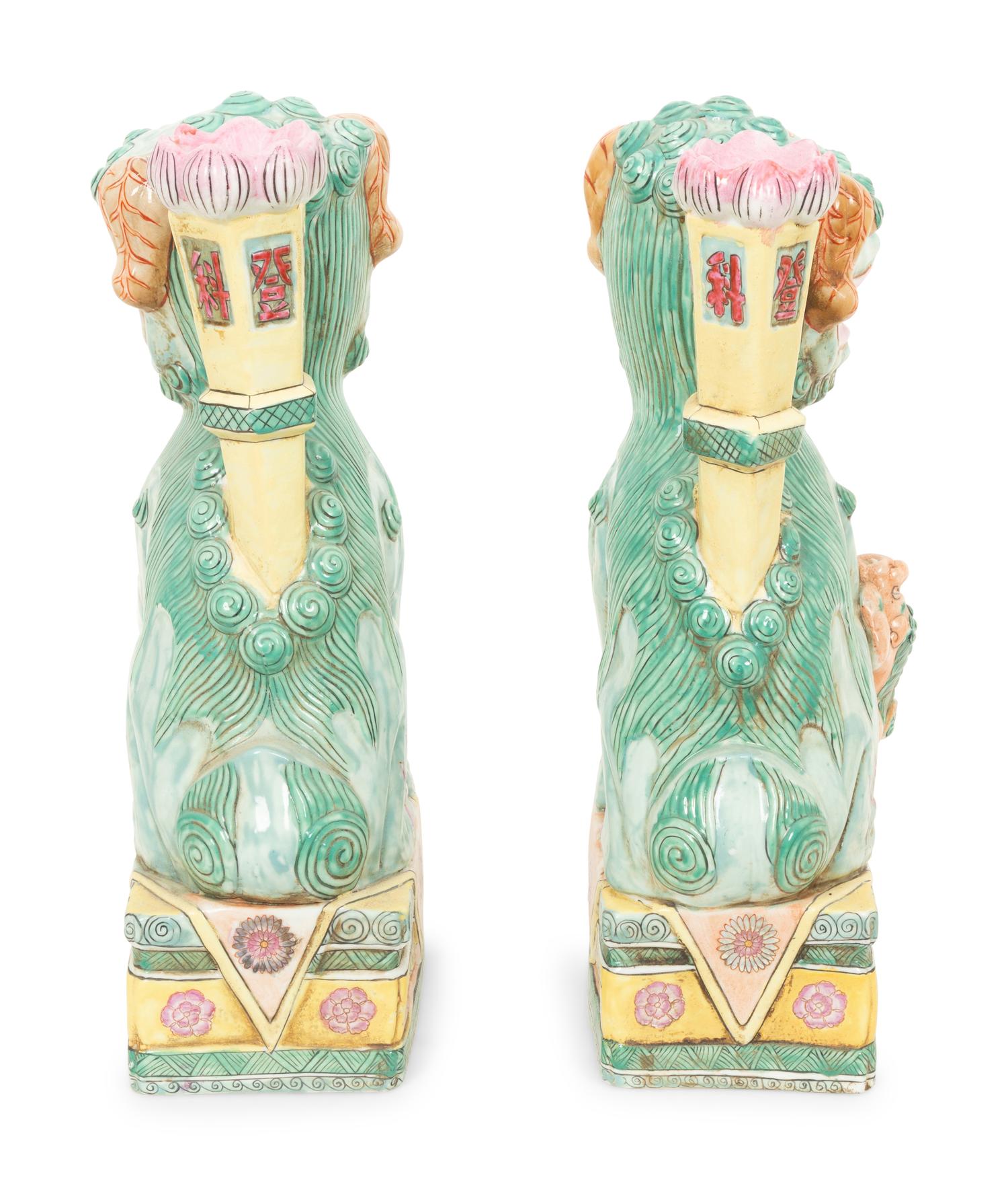 A Pair of Chinese Glazed Ceramic Seated Foo Lions