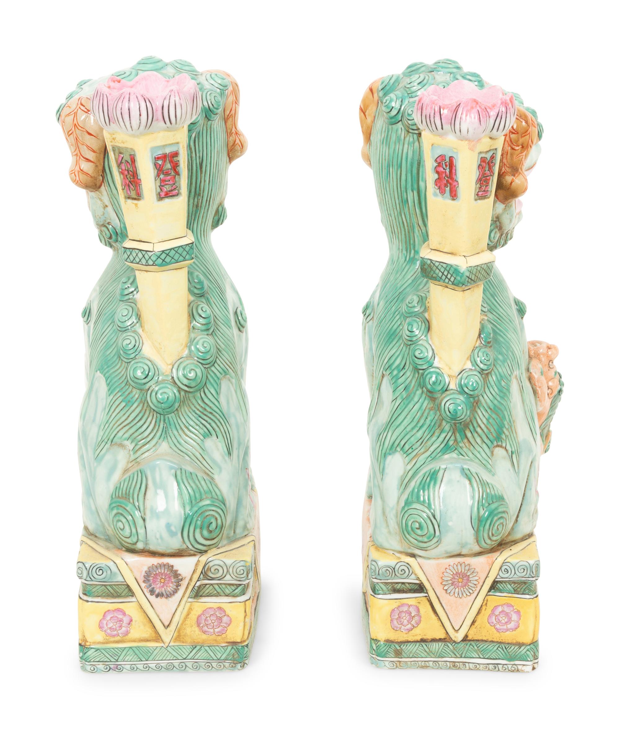 A Pair of Chinese Glazed Ceramic Seated Foo Lions