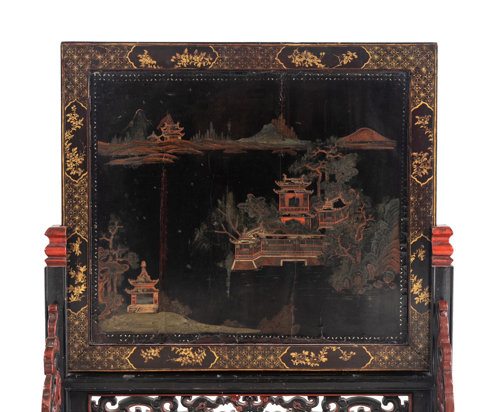 A Chinese Export Painted Table Screen in a Carved Lacquer Stand