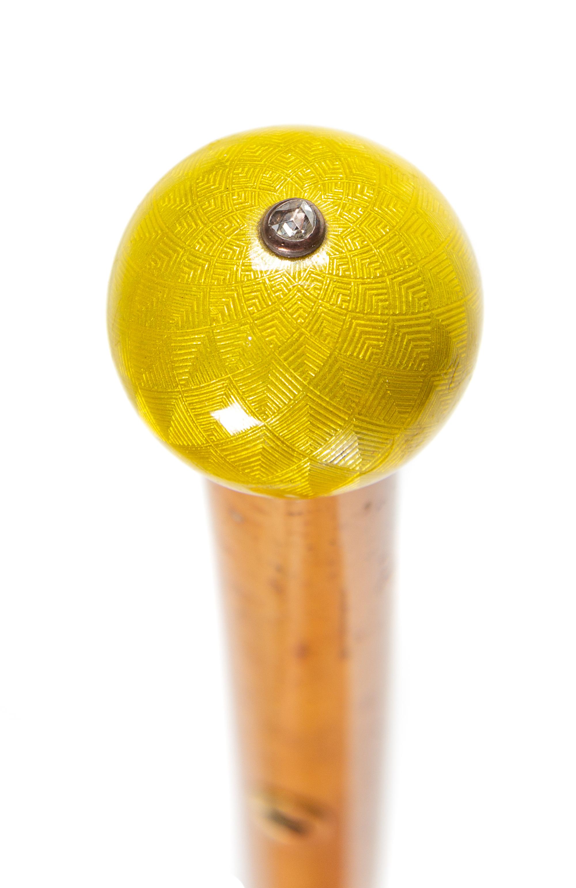 A Russian Diamond-Inset and Guilloche Enamel Mounted Walking Stick Length 33 5/8 inches. — WITH SPURIOUS FABERGE MARKS, 20TH CENTURY