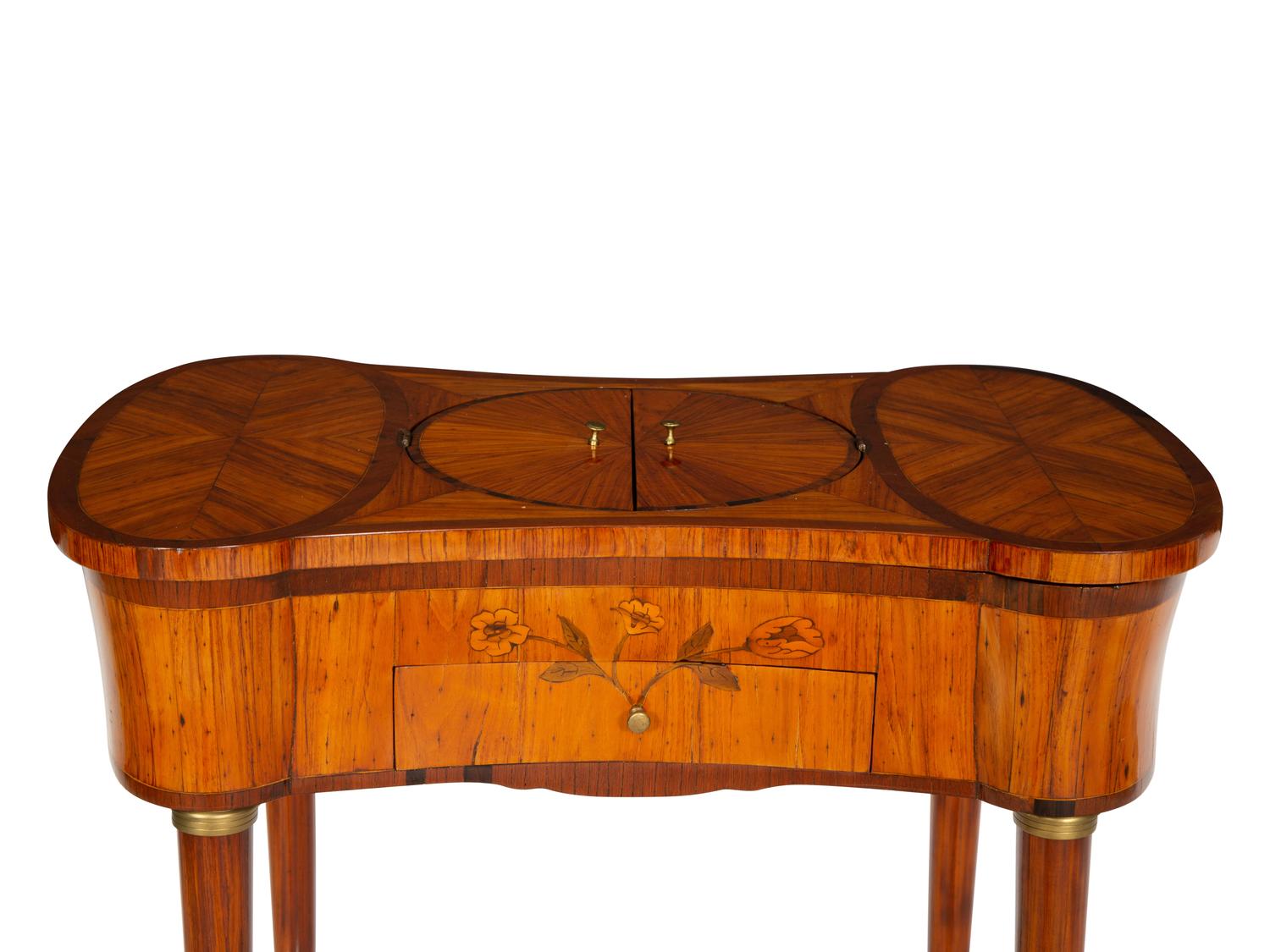 A Louis XVI Tulipwood and Marquetry Gilt Bronze-Mounted Sewing Table