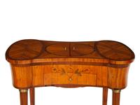 A Louis XVI Tulipwood and Marquetry Gilt Bronze-Mounted Sewing Table