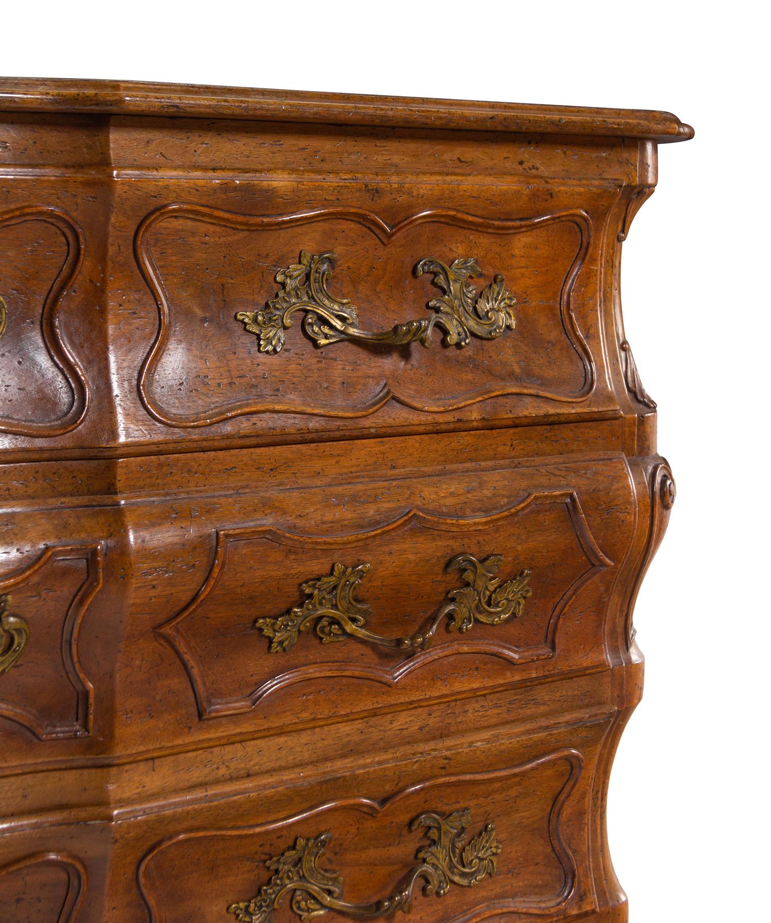 A French Provincial Shell-Carved Walnut Commode