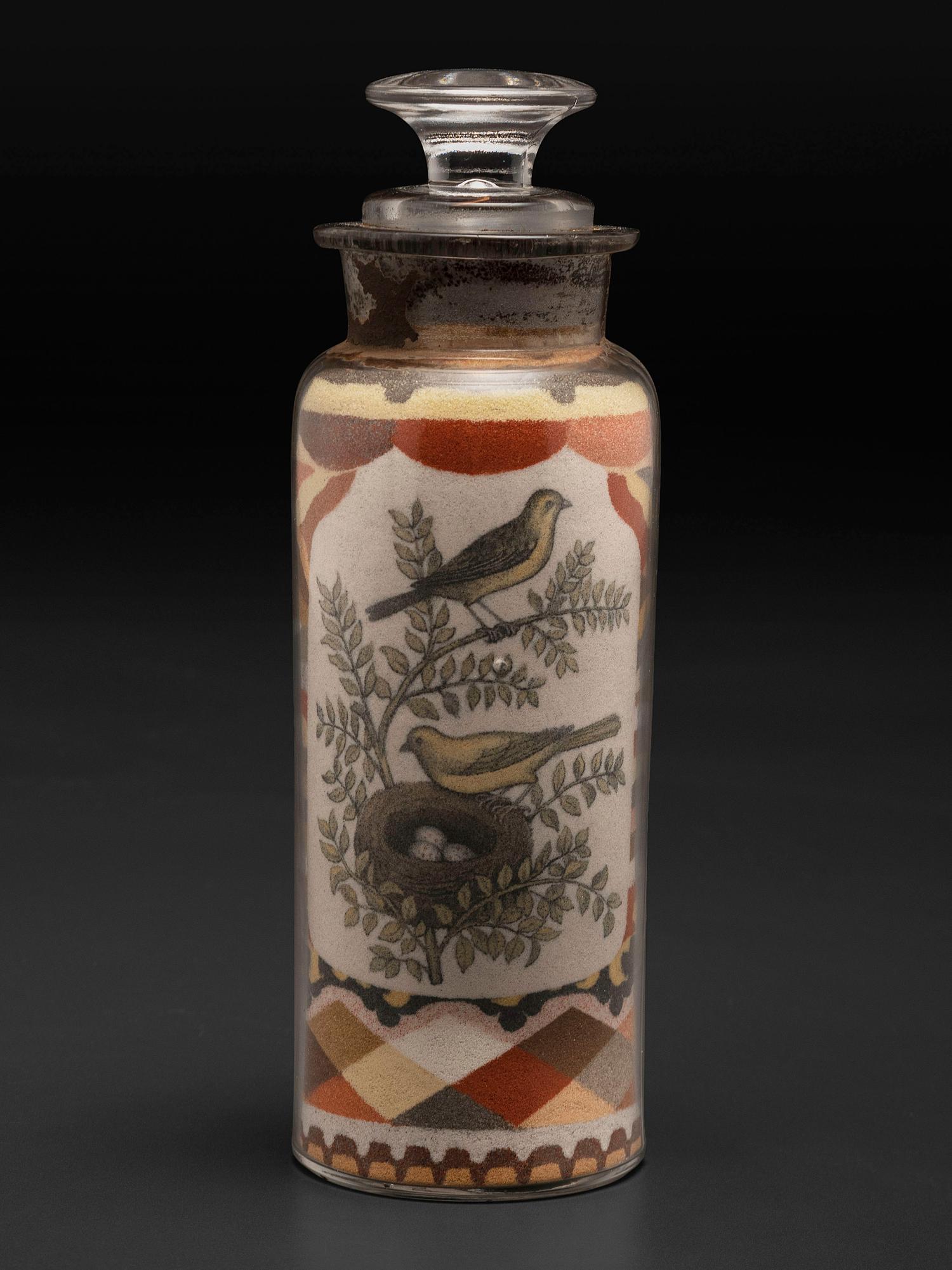 A Pair of Andrew Clemens (American, 1857-1894) 'Sweetheart' Sand Bottles
