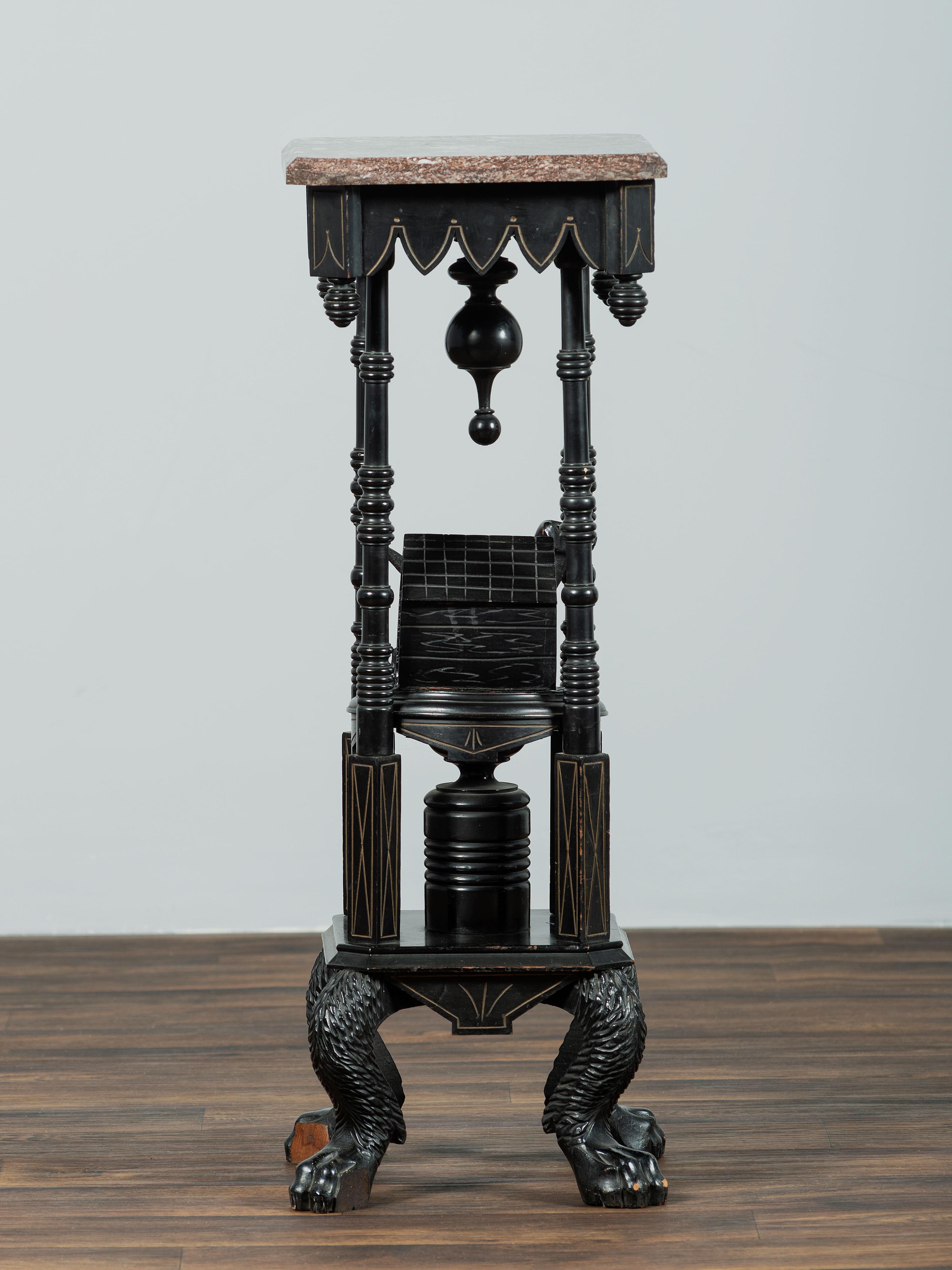 A Victorian Marble-Top Carved and Ebonized Parlor Table with Dog