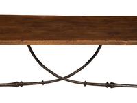 A Spanish Walnut and Wrought Iron Trestle Table