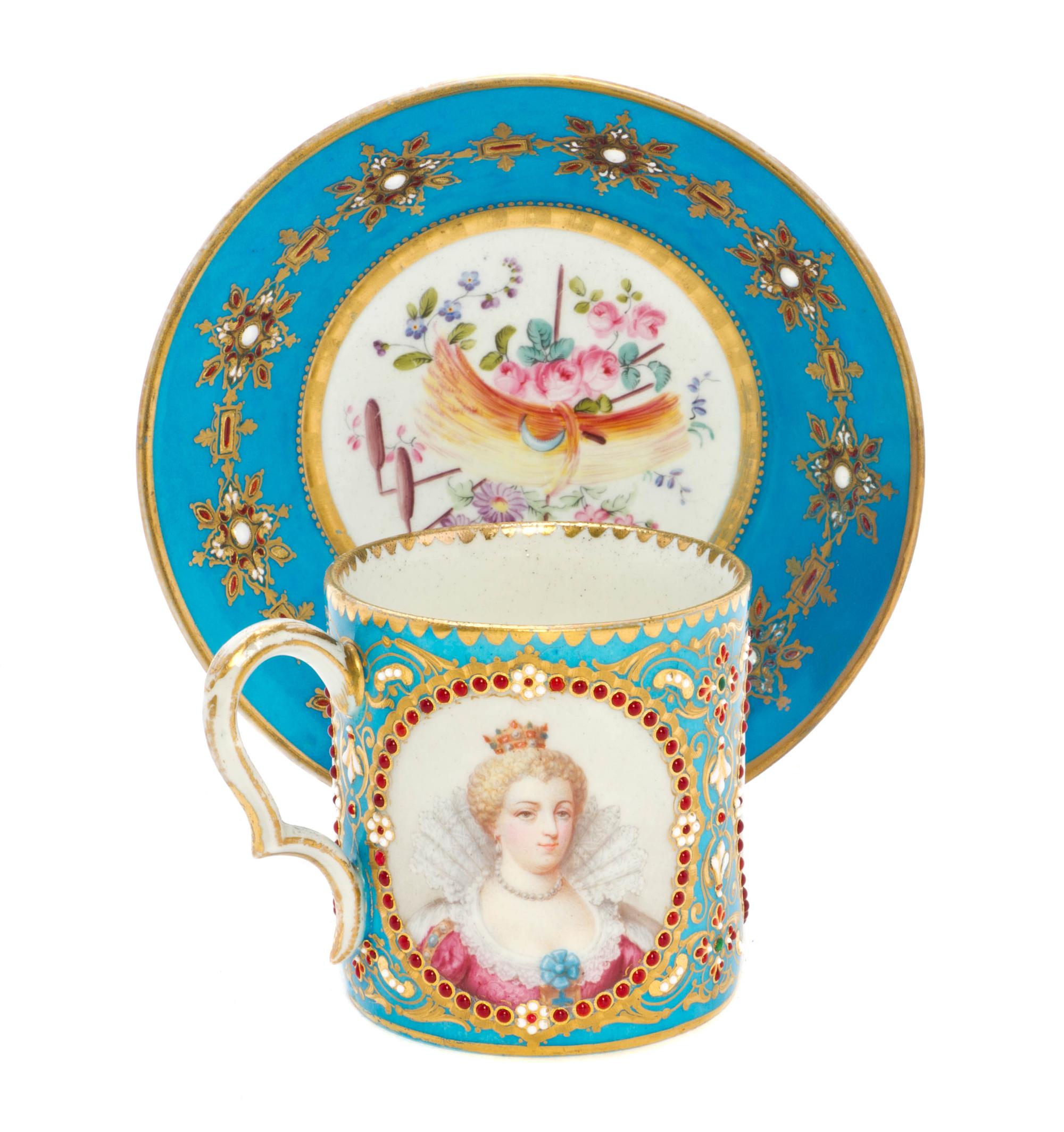 A Sevres Porcelain Jeweled Cup and Saucer, Diameter of saucer 5 1/2 inches.