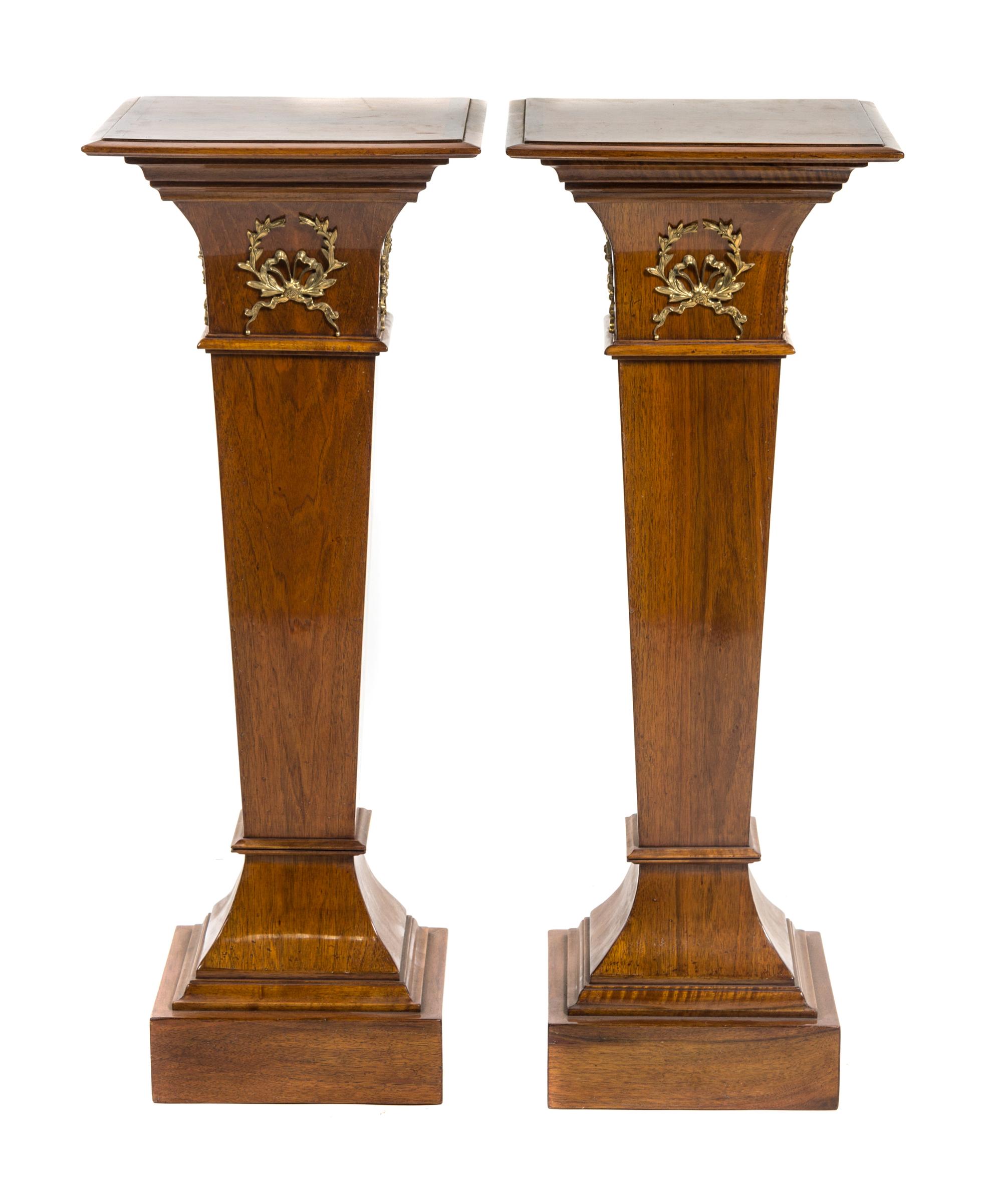 A Pair of Continental Gilt Metal Mounted Mahogany Pedestals, Height 42 3/4 inches.