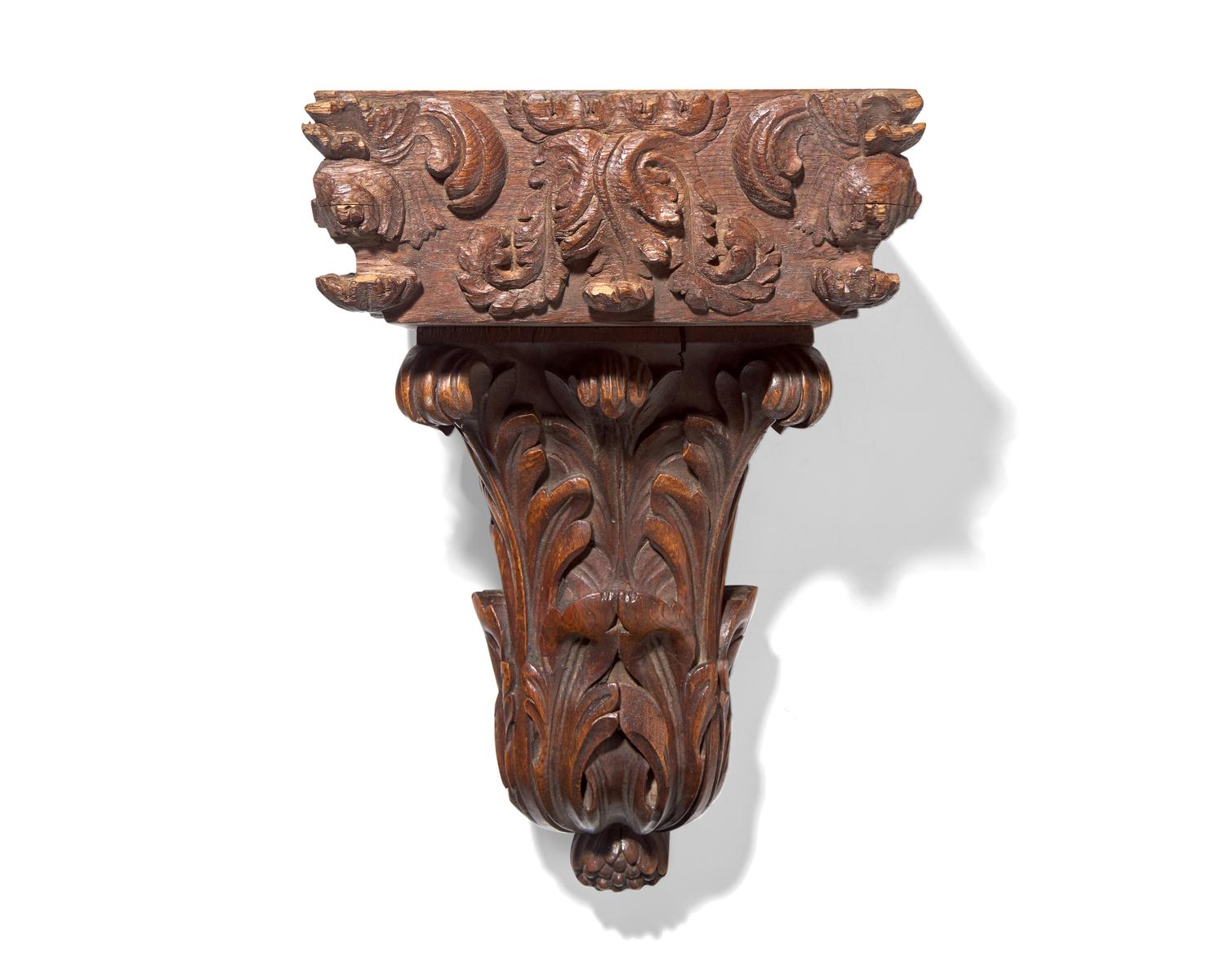A French carved oak wall bracket and column capital, 18th / 19th century
