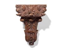 A French carved oak wall bracket and column capital, 18th / 19th century