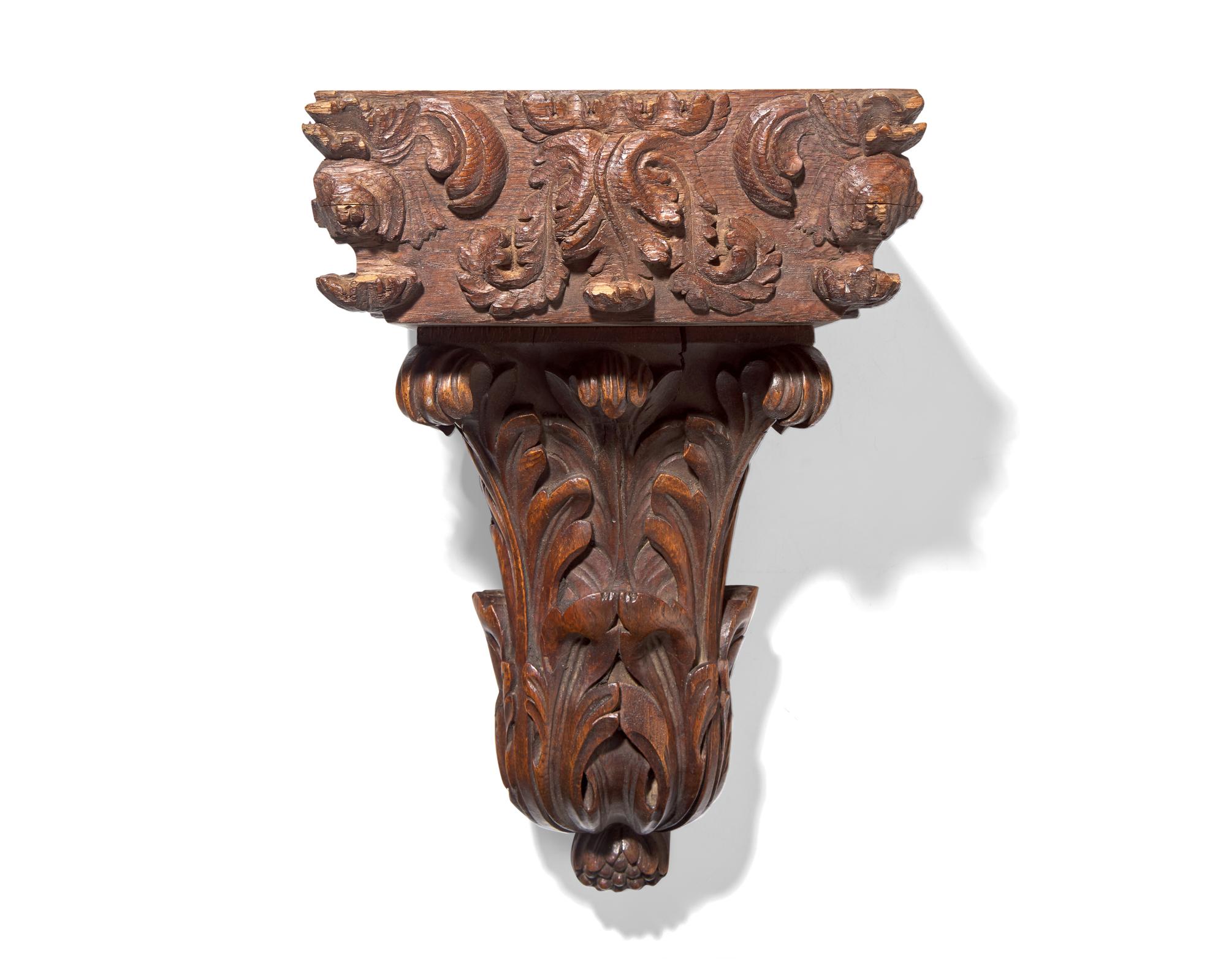 A French carved oak wall bracket and column capital, 18th / 19th century