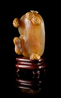 A Carved Agate Snuff Bottle Height 2 1/2 inches. — 19TH CENTURY