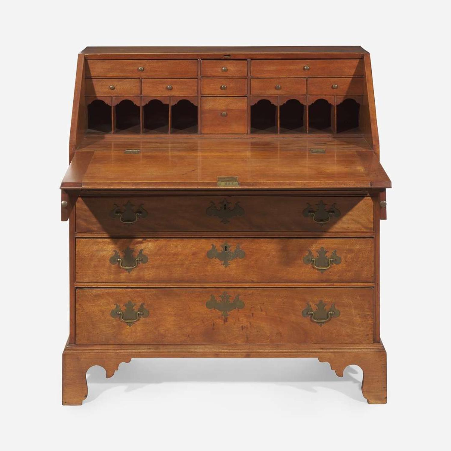 A Chippendale carved and figured walnut slant-front desk New England, late 18th century