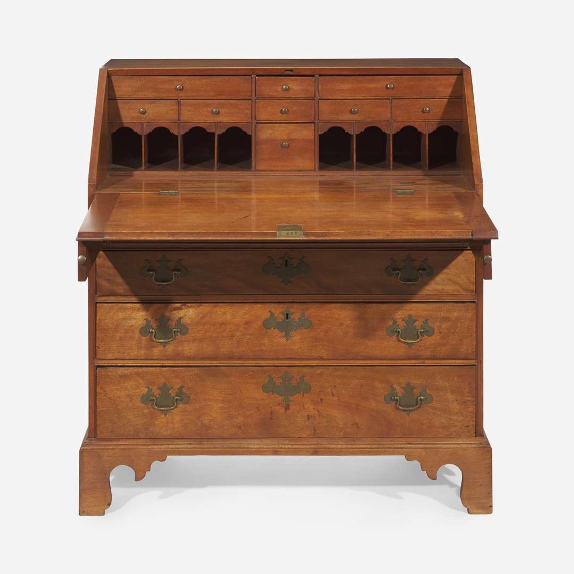 A Chippendale carved and figured walnut slant-front desk New England, late 18th century