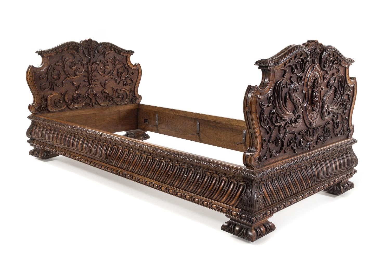 A Renaissance Revival Carved Walnut Bed Height of headboard 35 1/2 inches. — LATE 19TH/EARLY 20TH CENTURY