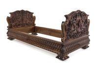 A Renaissance Revival Carved Walnut Bed Height of headboard 35 1/2 inches. — LATE 19TH/EARLY 20TH CENTURY