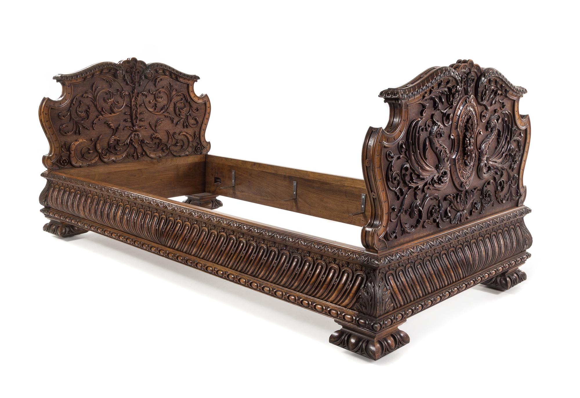 A Renaissance Revival Carved Walnut Bed Height of headboard 35 1/2 inches. — LATE 19TH/EARLY 20TH CENTURY