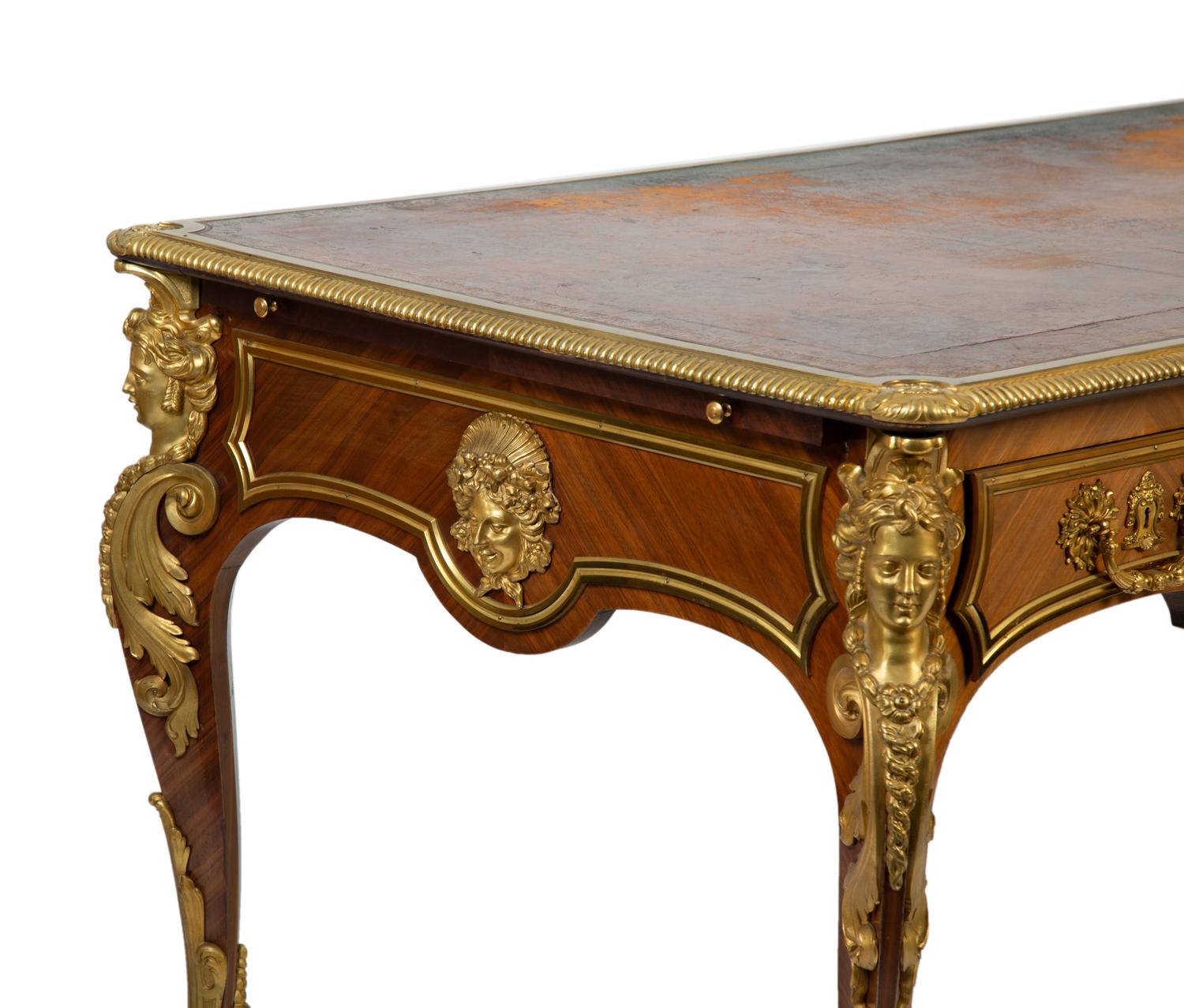 A Louis XVI Style Mahogany and Gilt Bronze Mounted Partners Bureau Plat — L. CUEUNIERES, THIRD QUARTER 19TH CENTURY