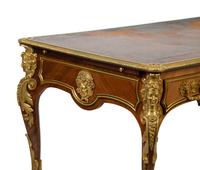 A Louis XVI Style Mahogany and Gilt Bronze Mounted Partners Bureau Plat — L. CUEUNIERES, THIRD QUARTER 19TH CENTURY