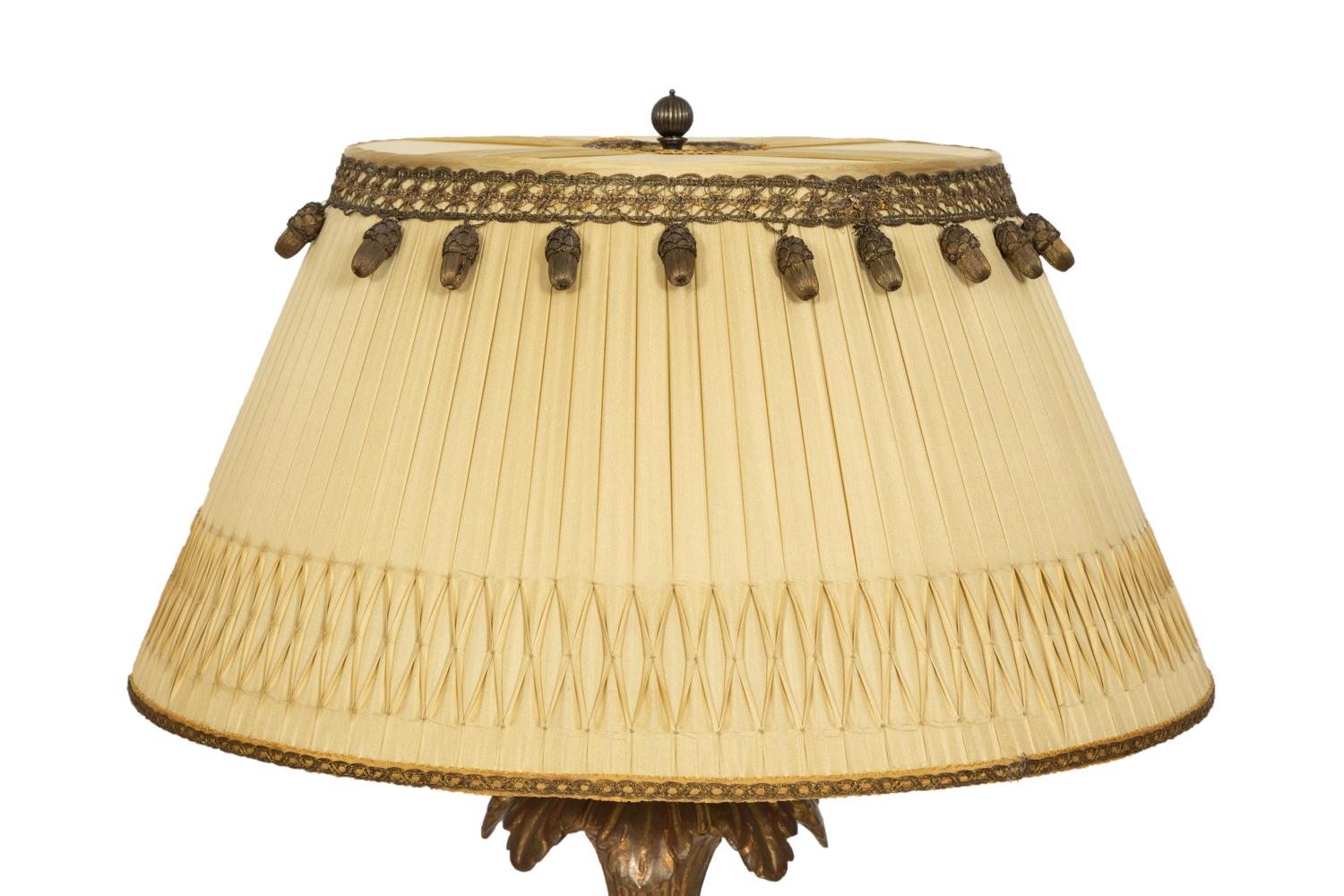 A Pair of XVI Style Carved Giltwood Lamps on Ebonized Pedestal Bases
