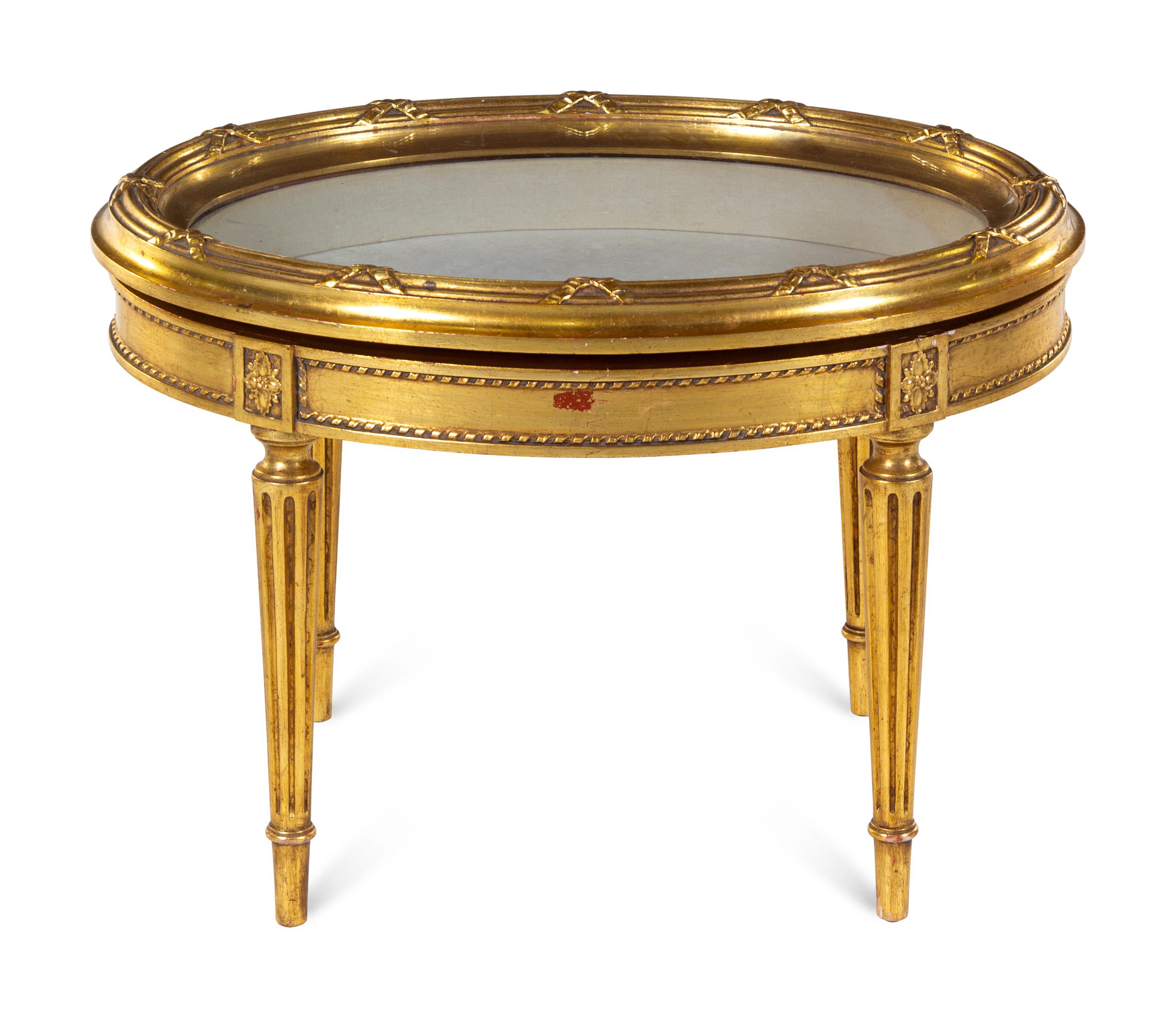 A Louis XVI Style Giltwood Vitrine Table