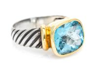 A Sterling Silver, 14 Karat Yellow Gold and Blue Topaz 'Noblesse' Ring, David Yurman, 7.50 dwts.