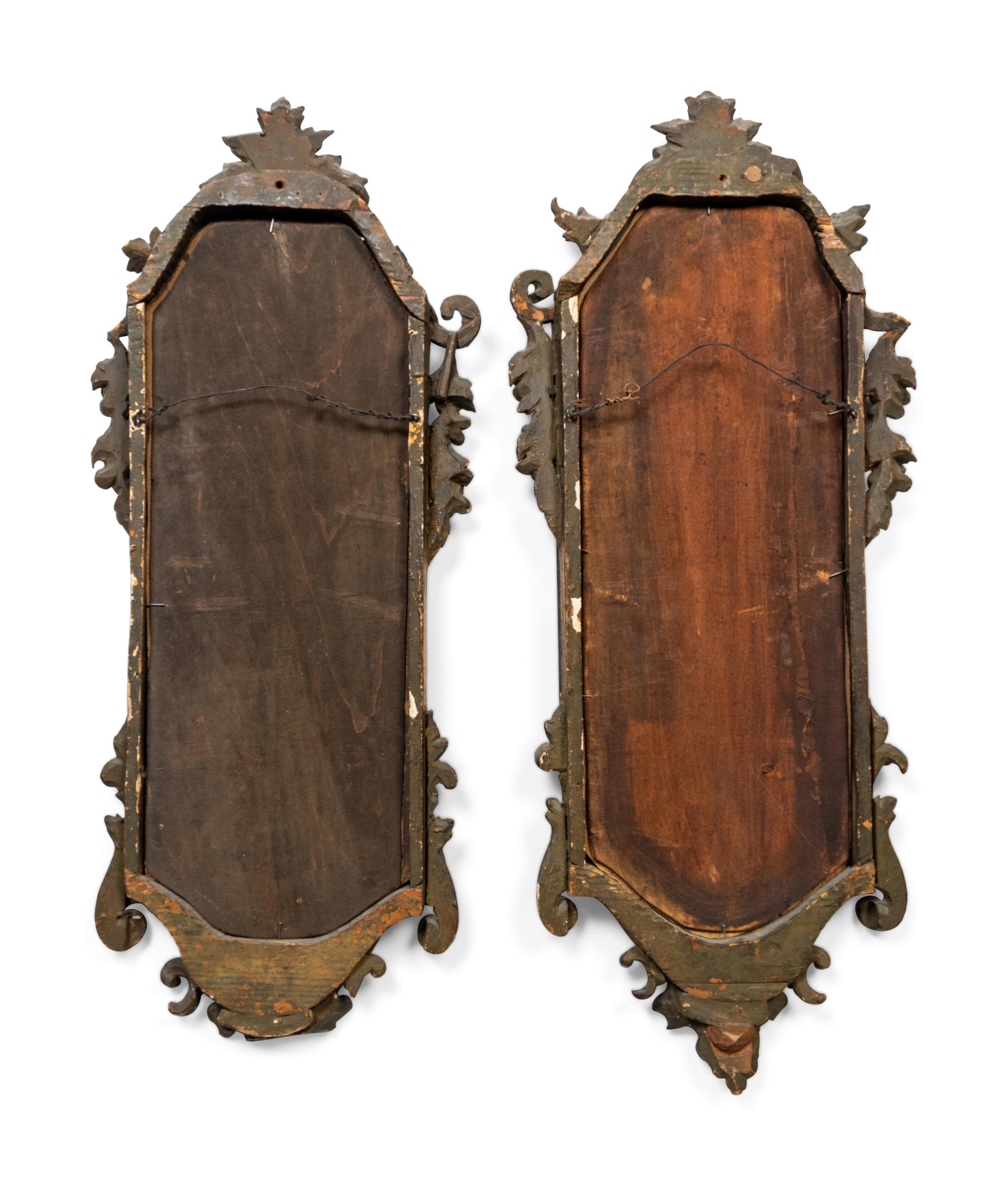 A Pair of Italian Carved Giltwood Mirrors