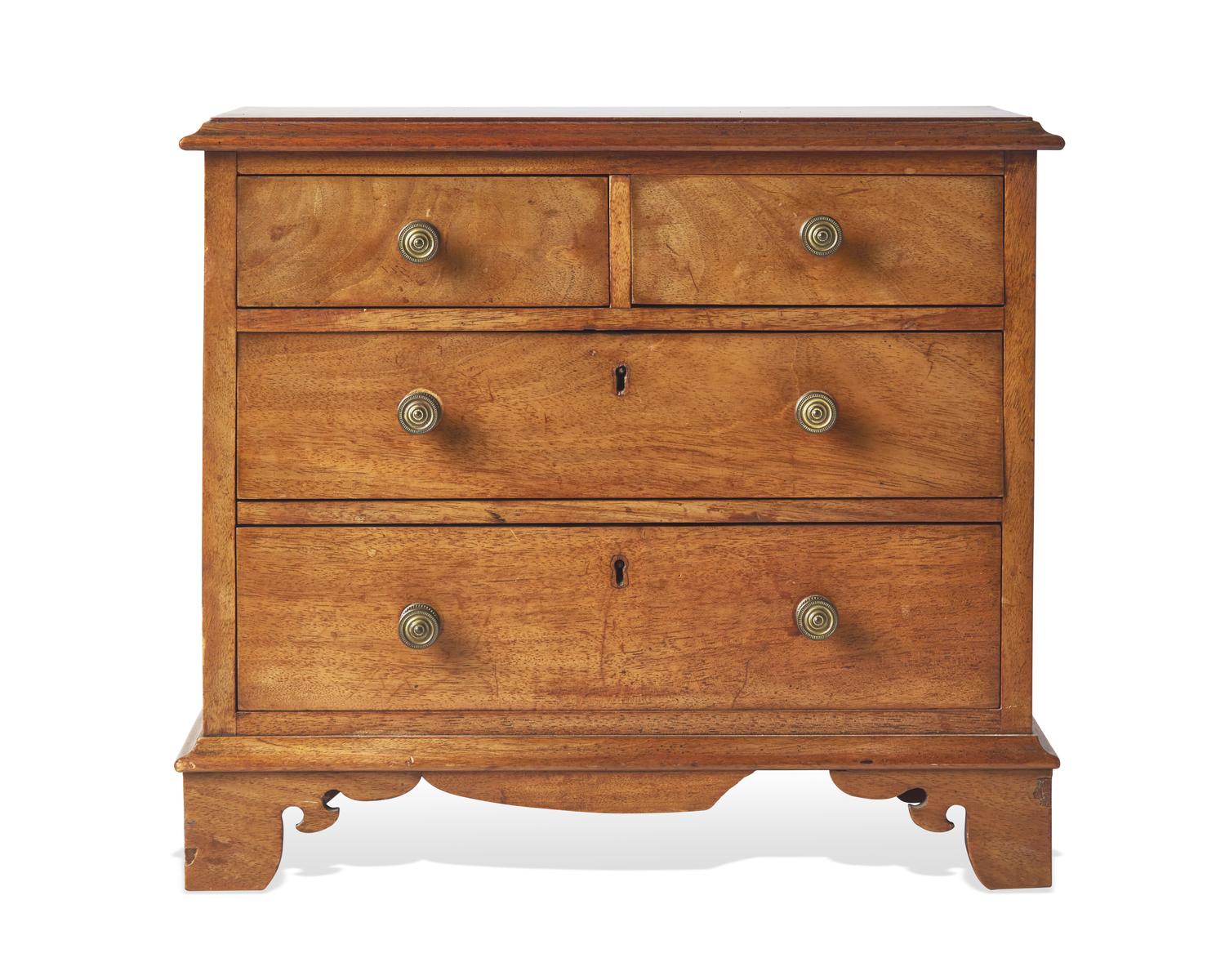 A Miniature George III or Regency Mahogany Chest of Drawers