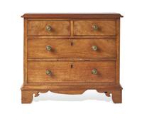A Miniature George III or Regency Mahogany Chest of Drawers
